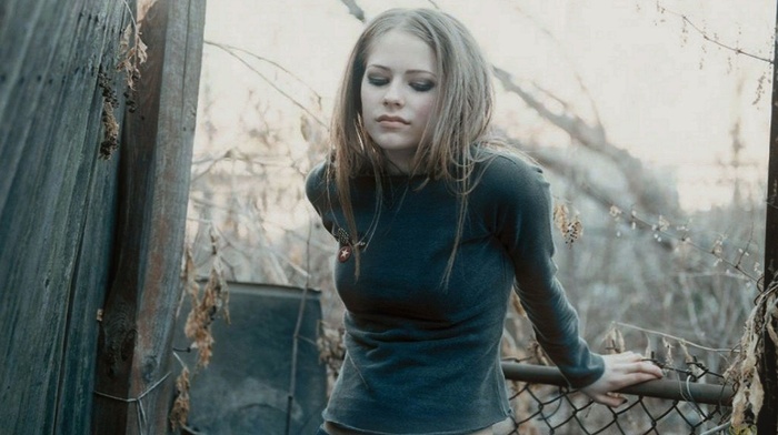 Avril Lavigne, singer, girl, black clothing, blonde, looking down