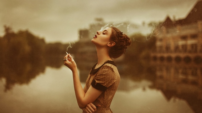 closed eyes, girl, smoking, cigarettes, arms on chest, girl outdoors, hair bun, sepia, looking up, polka dots