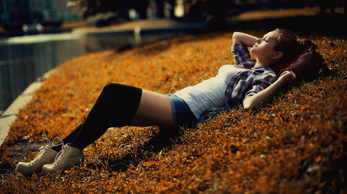 girl, closed eyes, jean shorts, grass, lying on back, plaid, girl outdoors