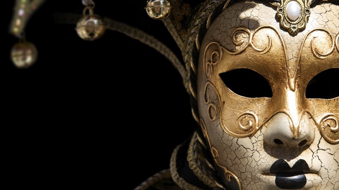 bell, venetian masks, black background