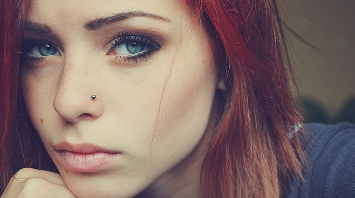 redhead, blue eyes, piercing