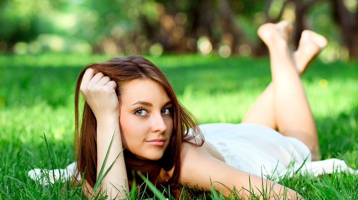 field, face, white dress, grass, park, long hair, girl, depth of field, lying on front, model, girl outdoors, brunette