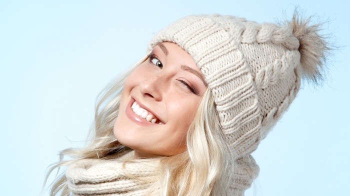 woolly hat, girl, smiling, winking
