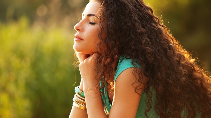 brunette, girl outdoors, girl, blurred, closed eyes, long hair, curly hair