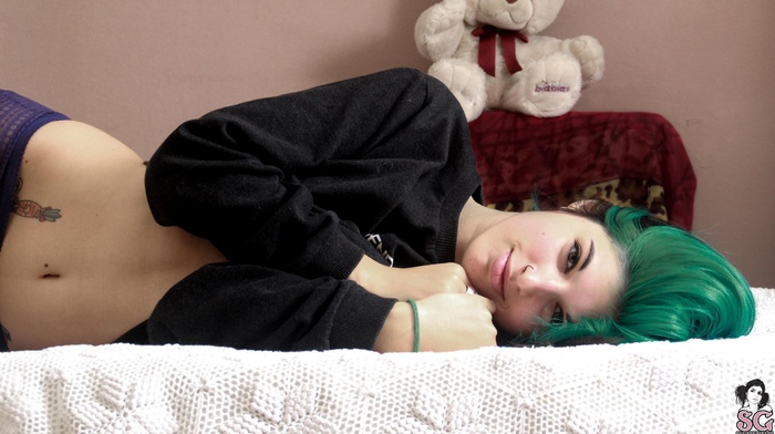 Marteline Suicide, bed, tattoo, laying on side, flat belly, girl, green hair, looking at viewer, Suicide Girls, face