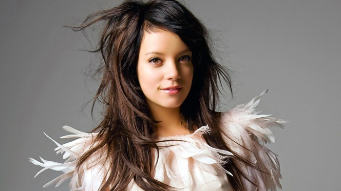 white dress, singer, celebrity, looking at viewer, girl, Lily Allen, gray background, feathers, smiling, brunette, long hair, face
