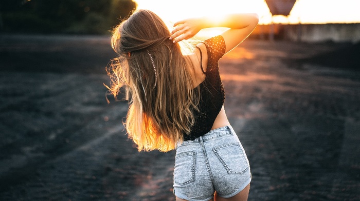 sunlight, nature, long hair, model, girl, ass, girl outdoors, jean shorts, rear view, brunette, hands in hair