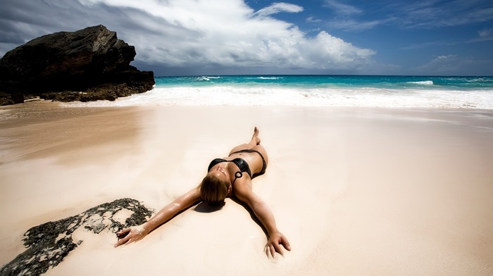 auburn hair, rock, wet body, girl, bikini, beach, sea, wet, legs  crossed, lying down, clouds, black bikinis