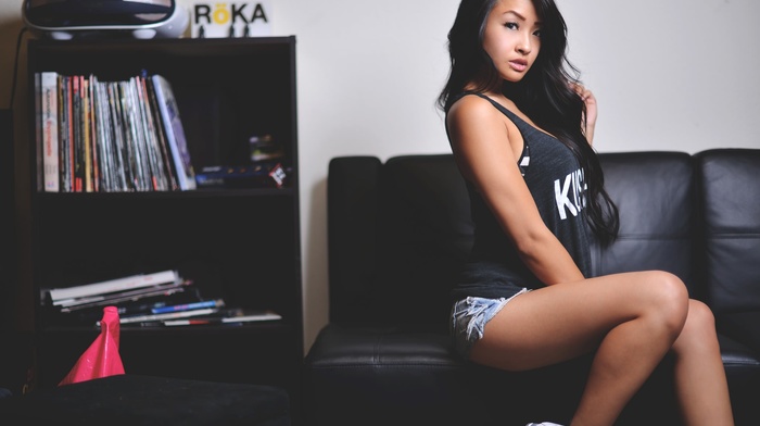 Asian, couch, dark hair, long hair, girl, legs together, shoes, sitting, jean shorts, bra, arched back