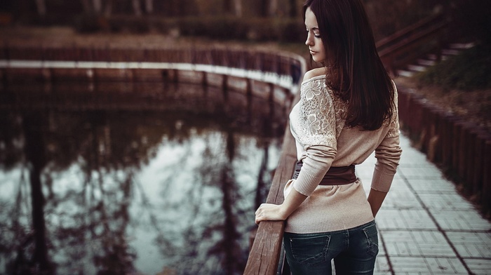 girl outdoors, filter, girl, lake, long hair, brunette, jeans, depth of field, closed eyes, back, fence, muted