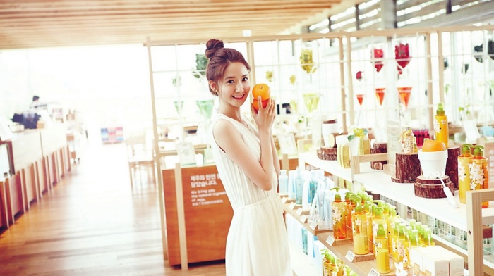 Asian, girl indoors, hair bun, white dress, Im Yoona, brunette, smiling, looking at viewer, orange fruit, dress