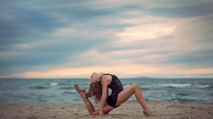 gymnastics, girl outdoors, beach