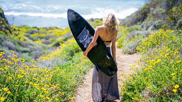 girl outdoors, surfing, blonde, skull and bones, model