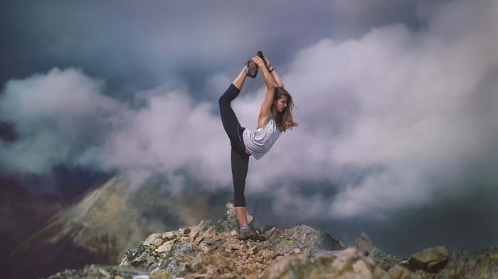 hiking, long hair, nature, girl, girl outdoors, clouds, yoga, mountain, tights, depth of field, rock, legs up, open mouth, brunette, sports, tank top, stretching, mist, model, bare shoulders