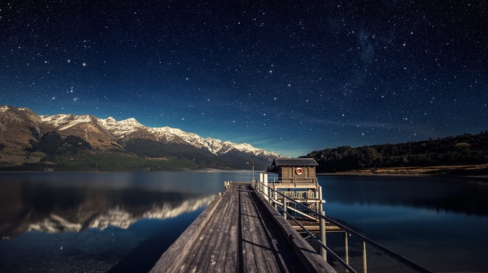 snowy peak, mountain, horizon, landscape, wood, reflection, mist, hill, stars, lake, nature, wooden surface, house, water, trees, pier, forest, shadow, night