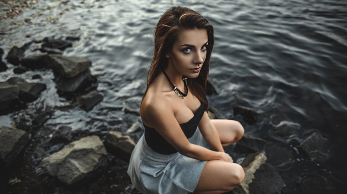 rock, looking at viewer, sitting, girl, skirt, portrait, river