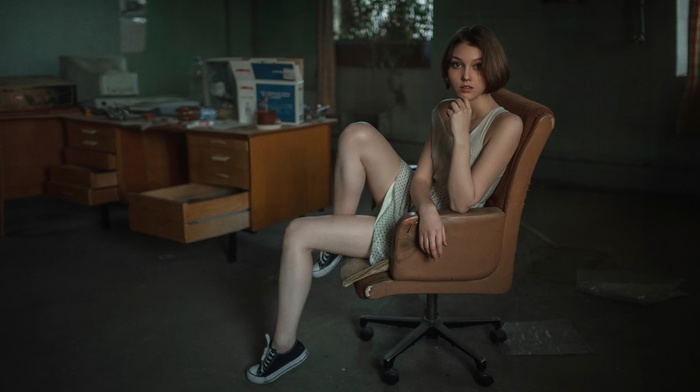 skirt, model, chair, open mouth, office, looking at viewer, Georgiy Chernyadyev, long hair, legs, tank top, Converse, table, brunette, polka dots, bare shoulders, girl, sitting
