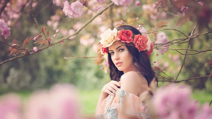 brunette, girl outdoors, flower in hair, girl, Aurela Skandaj, flowers, blue eyes