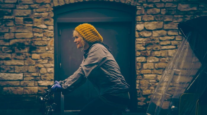 girl, blonde, woolly hat, bicycle