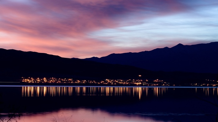 lake, sunset, evening, city, water, calm, cityscape, reflection, lights, mountain