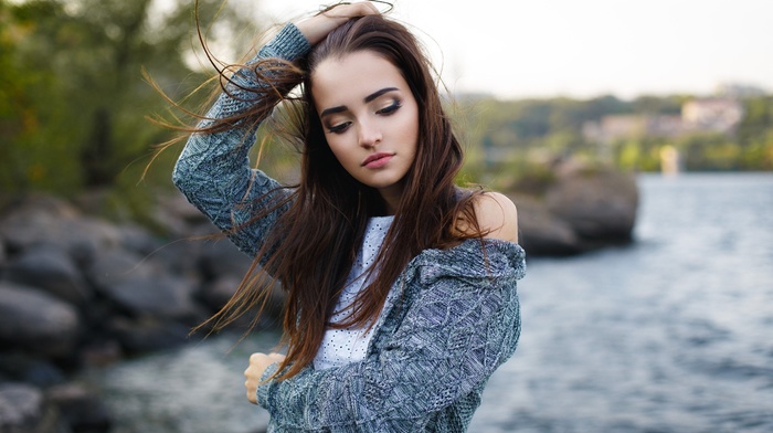 looking down, girl, hands in hair, river, portrait