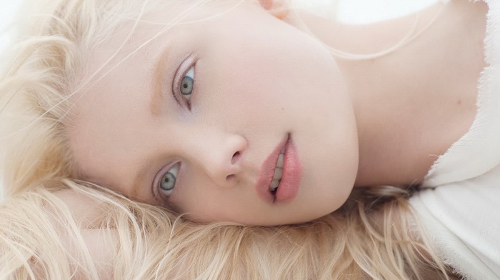 Daria Zhemkova, lying down, long hair, model, blonde, face, pale, blue eyes, girl