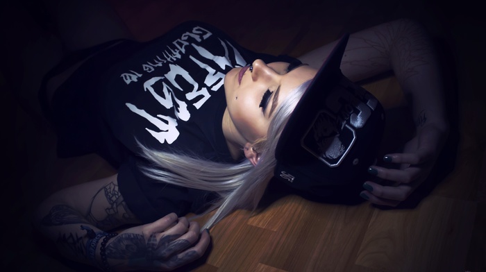 thong, T, shirt, on the floor, tattoos, closed eyes, baseball caps, girl, wooden surface, piercing