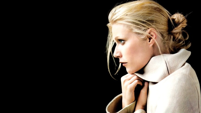 Gwyneth Paltrow, side view, girl, black background, actress, black, blue eyes, hair bun, simple background, blonde, face