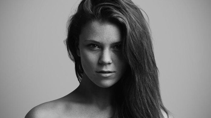 girl, monochrome, portrait, bare shoulders, simple background, brunette, looking at viewer, long hair, face, freckles, eyes
