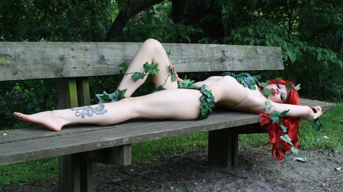 pierced navel, girl outdoors, lying on back, model, tattoo, trees, park, legs, looking at viewer, DC Comics, makeup, armpits, Poison Ivy, long hair, strategic covering, redhead, skinny, leaves, cosplay, red lipstick, girl, bench