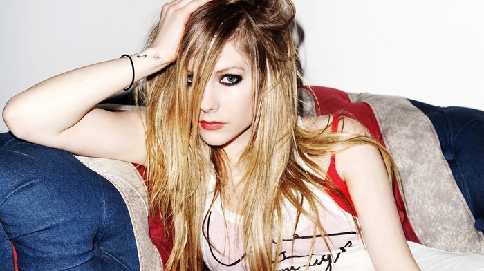 Avril Lavigne, looking at viewer, couch, singer, hands on head, girl, celebrity