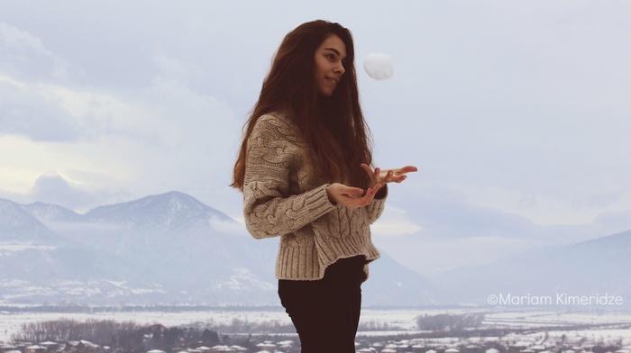 girl, smiling, snowy mountain, snow, snowball, alone, long hair, winter, sweater