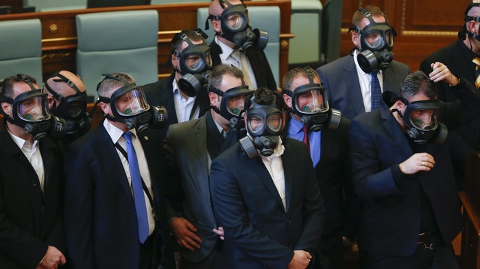 suits, Kosovo, gas masks, politics