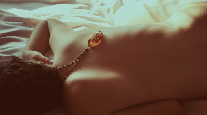 lying on front, girl, necklace, back