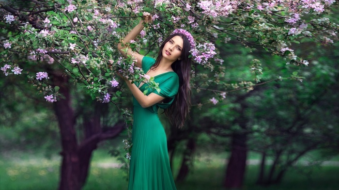 green dress, girl, flowers, wreaths, girl outdoors, trees, model