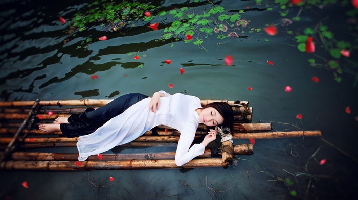 lying on back, girl, girl outdoors, water, long hair, brunette, model, barefoot, raft, nature, closed eyes, Asian, bamboo, flower petals