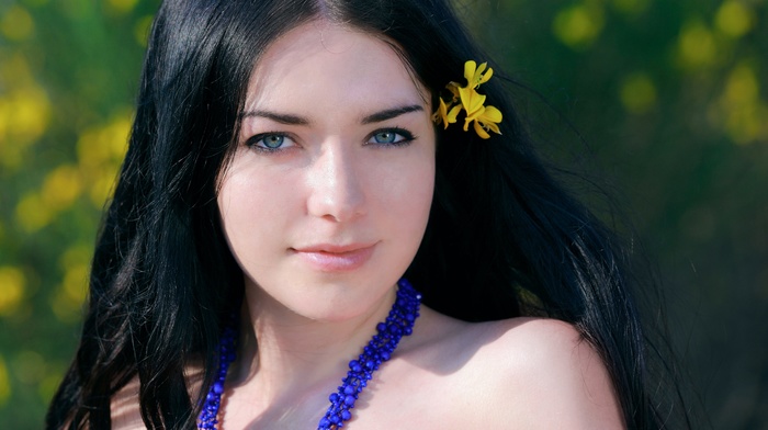 green eyes, black hair, looking at viewer, flower in hair, portrait, girl, girl outdoors, Olivia F