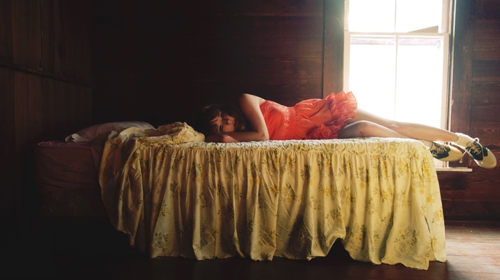 girl, socks, wooden surface, in bed, looking at viewer, bare shoulders, model, long hair, brunette, window, red dress, open mouth, shoes, lying on side