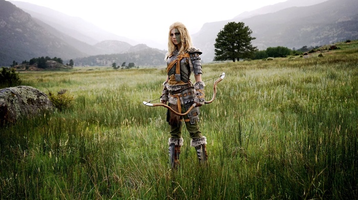 armor, long hair, outdoors, standing, pigtails, bow, cosplay, the elder scrolls v skyrim, blonde, girl