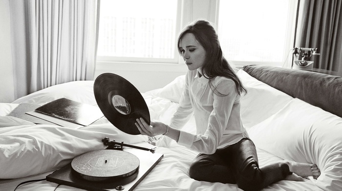 actress, Ellen Page, telephone, curtain, leather pants, Gramophone, sitting, in bed, barefoot, vinyl, brunette, blouses, girl, monochrome, long hair
