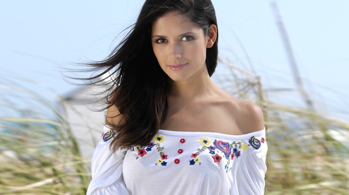 windy, straight hair, depth of field, smiling, brunette, long hair, model, looking at viewer, bare shoulders, girl outdoors, face, girl, Carla Ossa