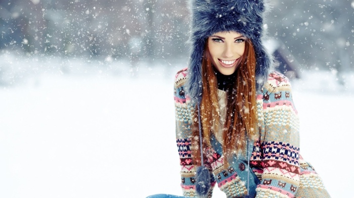snow, winter, fluffy hat, redhead, girl, smiling, depth of field, blue eyes