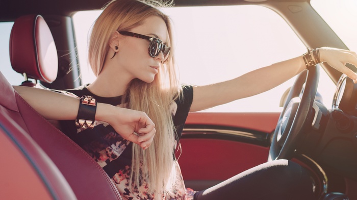 piercing, sunglasses, model, driving, blonde, girl with glasses, face, brunette, car interior, girl, red, T, shirt, long hair, car