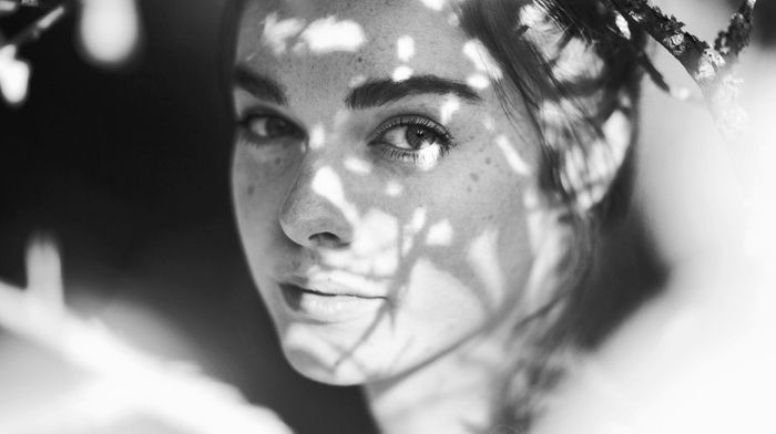 girl, monochrome, face, freckles, Ruby James, looking at viewer, dappled sunlight
