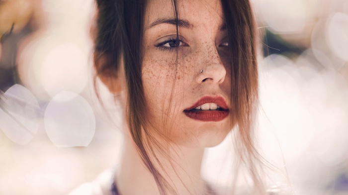 Ruby James, red lipstick, freckles, hair in face, pierced nose, girl, Skye Thompson, looking away