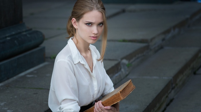 books, looking at viewer, sitting, blue eyes, girl