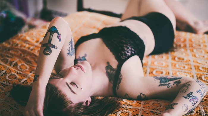 in bed, lying on back, piercing, girl, brunette, tattoo