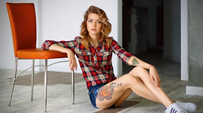 on the floor, sitting, looking at viewer, jean shorts, girl, tattoo, ass, chair, sneakers
