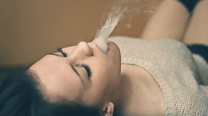 Caucasian, smoking, closed eyes, girl, dark hair, lying on back, model, smoke, boobs