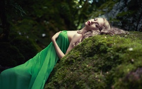 girl, lying on back, green dress, blonde, moss, girl outdoors